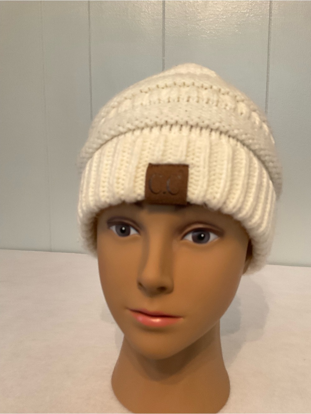 C. C. Exclusive Cream White Knit Beanie Hat Faux Leather Logo Patch